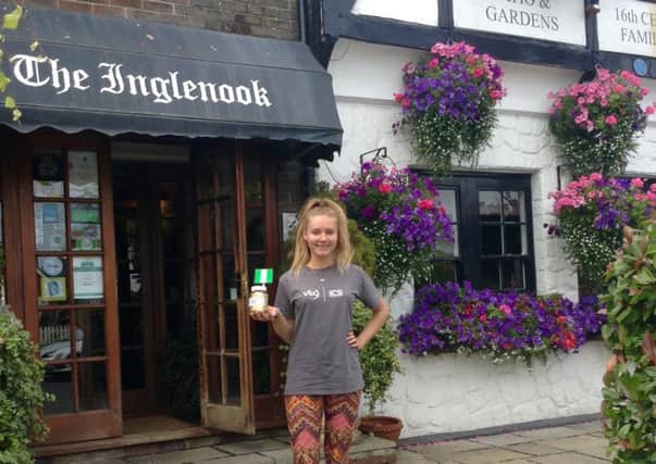Melissa Carrington outside The Inglenook, where she held a pub quiz and auction