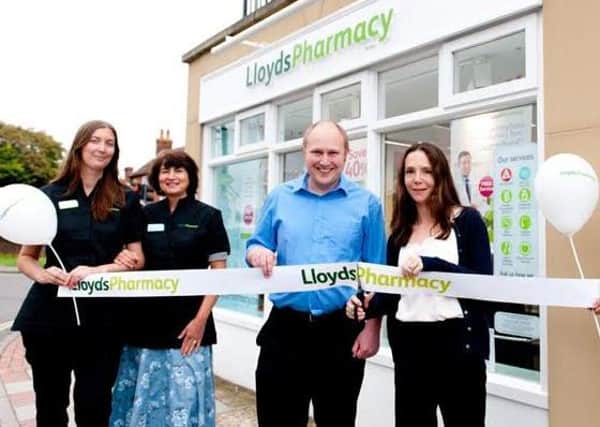 At the cutting edge of health in Selsey: Dr Edward Fox and Dr Arabella Sargent (centre) cut the ribbon with (from left) Amy Cooper, pharmacist Carmen Moir and Janet Jackson looking on. SUS-150821-153359001