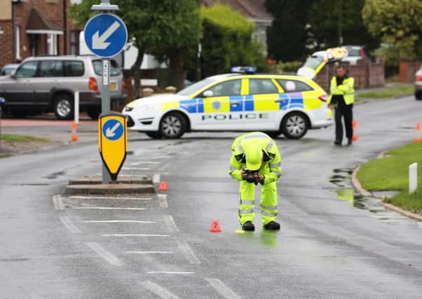 Police working at the scene of the crash in Abbey Road, Sompting.  PICTURE BY EDDIE MITCHELL SUS-150819-183122001