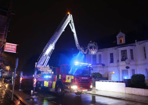 Firefighters remove a man from a flat in Rowlands Road, Worthing       Picture: Eddie Mitchell