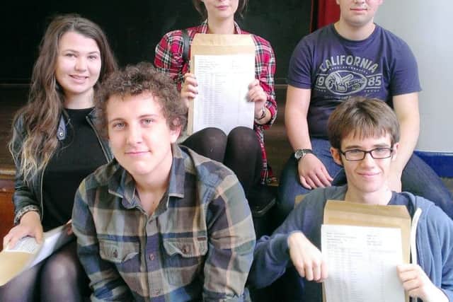From left: Aimee Wright, Morgan Connor, Victoria Hawes, Steven Kuc and Michael Hobson - all students at Bourne Community College celebrate bumper GCSE results SUS-150820-131552001