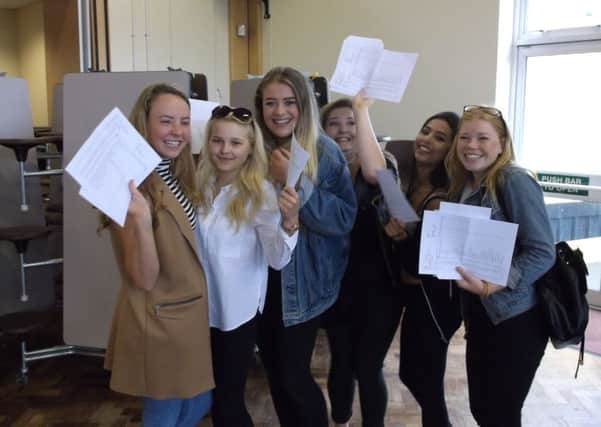 Pupils at Millais School celebrate their GCSE results