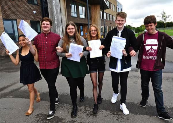 Happy students collecting their results from The Littlehampton Academy   PHOTO: Stephen Goodger SGTLA1