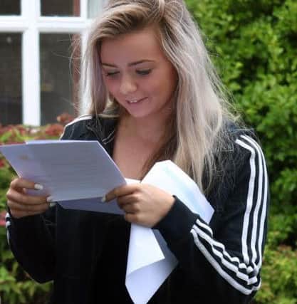 Celebrating their GCSE results at Lavant House School SUS-150820-175934001