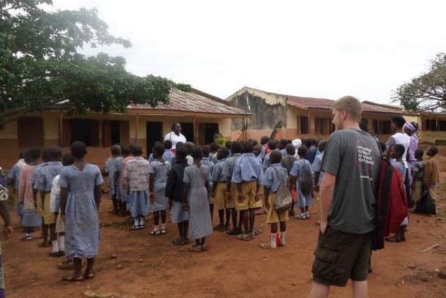 With pupils outside the school in Nigeria UiqNfErBGd1Xhulfa93C