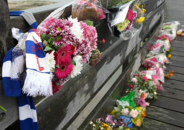 Floral tributes on the Old Toll Bridge DM157072a