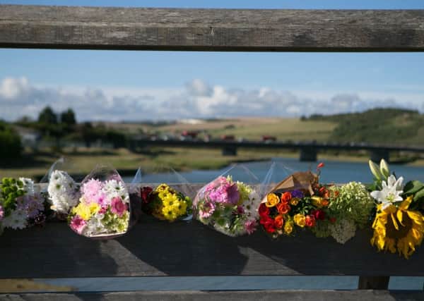 Flowers laid on the Shoreham Tollbridge Picture: Daniel Leal-Olivas/PA Wire