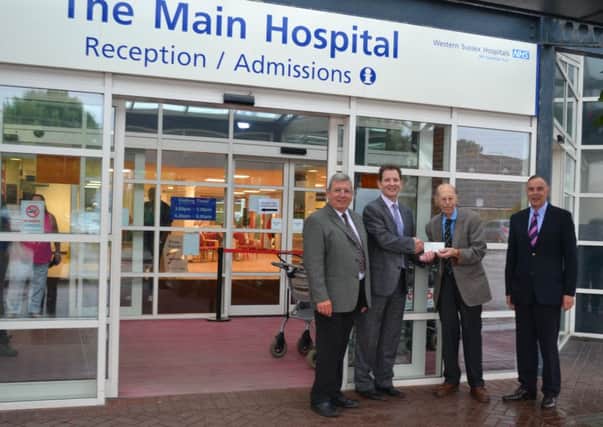 Chichester Masonic Lodge of Union no.38 hands over a cheque for £10,000
