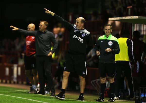Paul Cook is working to put a good scouting system in place at Pompey. Picture: Joe Pepler