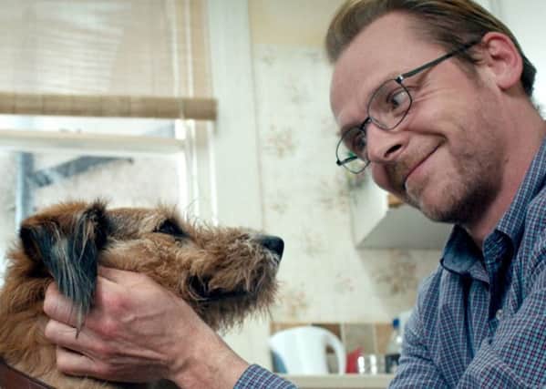 Simon Pegg with friend (voiced by Robin Williams).