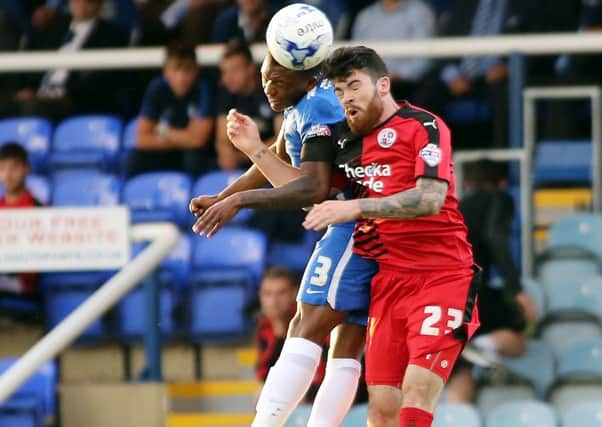 Kgosi Ntlhe of Peterborough United battles with Liam Donnelly of Crawley Town - Mandatory byline: Joe Dent/JMP - 07966386802 - 11/08/2015 - FOOTBALL - ABAX Stadium -Peterborough,England - Peterborough United v Crawley Town - Capital One Cup EMN-150813-122844002