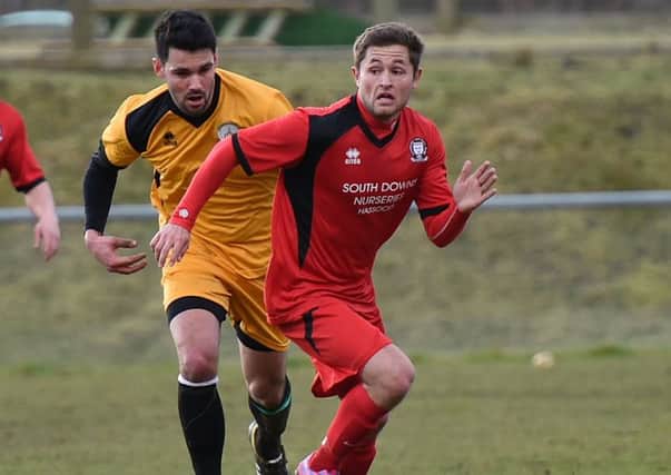Sussex County Football League.  Hassocks FC v Chichester FC. Action from the match. Picture : Liz Pearce. 210215. LP1500120 SUS-150221-190140008