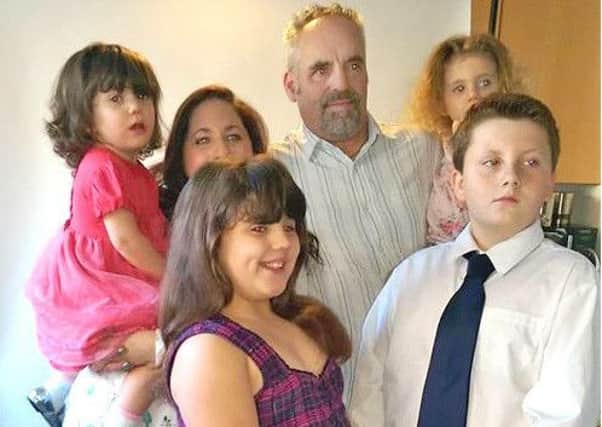 Mark Trussler with his fiancee Giovanna Chirico and four of his children
