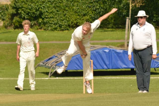 Dean Crawford bowling for Bexhill against East Grinstead on Saturday. Picture by Stephen Curtis (SUS-150830-172245002)
