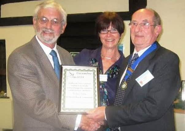 From the Grange Community Association, Graham Pooley and Joan Hursthouse, with Midhurst Town Councillor John Etherington CONTRIBUTED PICTURE SUS-150709-104653001