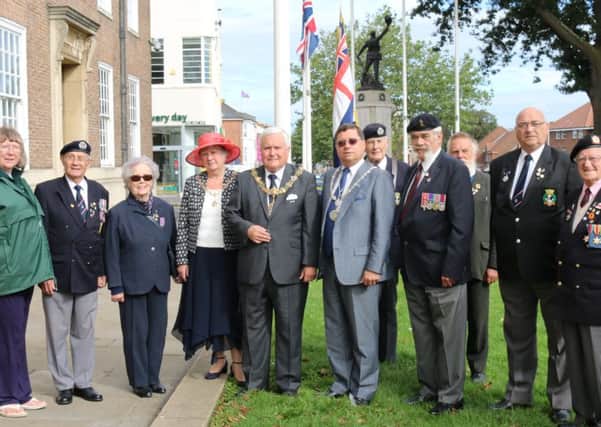 Dignitaries pay tribute to Merchant Navy seafarers at town hall ceremony