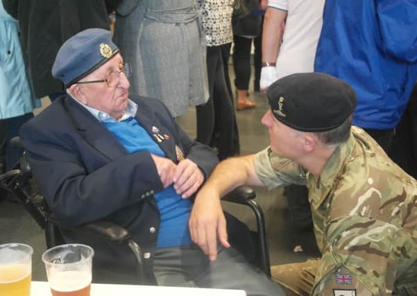 WW2 veteran Stanley Northeast meets Major Steve Hudson at Fontwell's Armed Forces Raceday / Picture by Marcus Gear