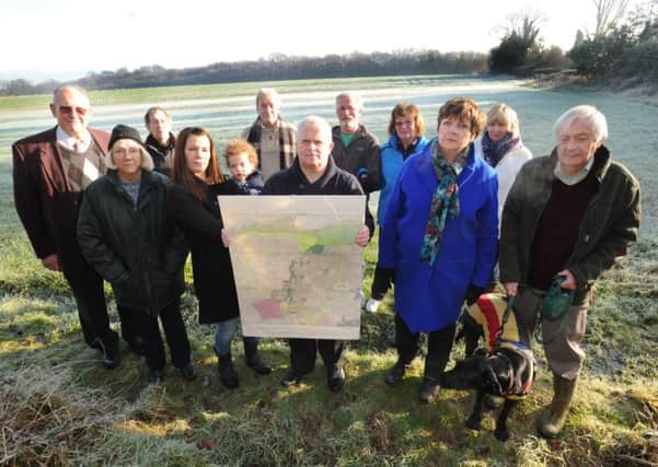 jpco 21-1-15 Residents opposed to the new housing development next to Rusper Road in Ifield (Pic by Jon Rigby) SUS-150120-111519001