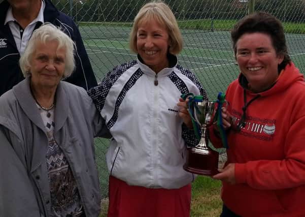 Gladys Ray presents some of the trophies at Fishbourne TC
