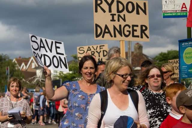 Rydon Community College march to Sullington Parish Hall before drop-in even SUS-150907-162038001