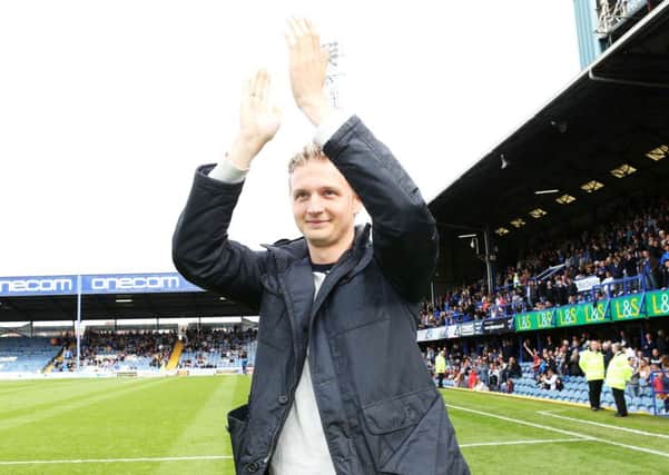 Former Pompey attacker Erik Huseklepp is applauded on to the Fratton Park pitch at half-time in the Blues' 0-0 draw with Accrington on Saturday   Picture: Joe Pepler