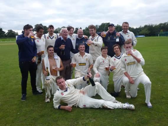 Hastings Priory celebrate promotion after victory over Crowhurst Park last weekend. Picture by Simon Newstead (SUS-150609-135946002)