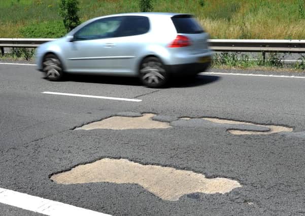 The potholes on the busy stretch of road have now been filled
