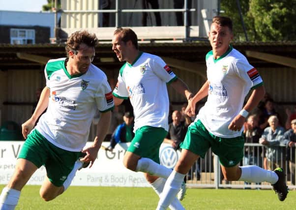 Bognor's Gary Charman (left) celebrates his late stike which put the Rocks into the next round of the FA Cup / Picture by Chris Hatton