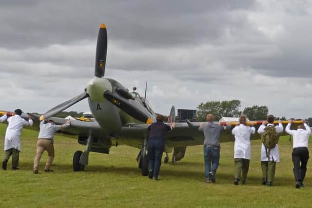 Getting the Spitfire ready PICTURE BY RICHARD COOKE