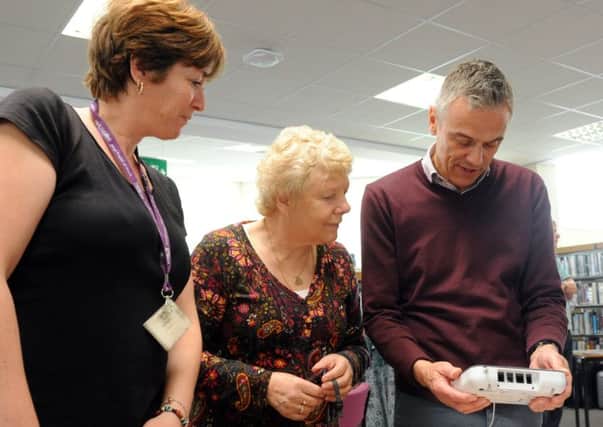 Lisa Labrum from Arun Lifeline, Mary Evison from MIND and Tim Wilkins from the Alzheimers Society at an earlier dementia awareness day, held at Bognor Regis Library ks1500070-2