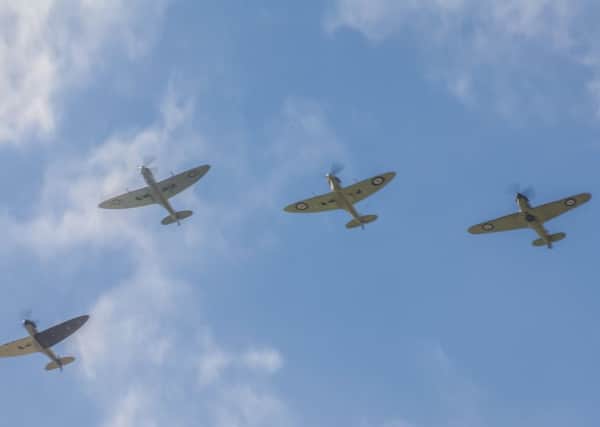Vintage wartime planes drew crowds of people onto the seafront   Picture: Peter Pollack