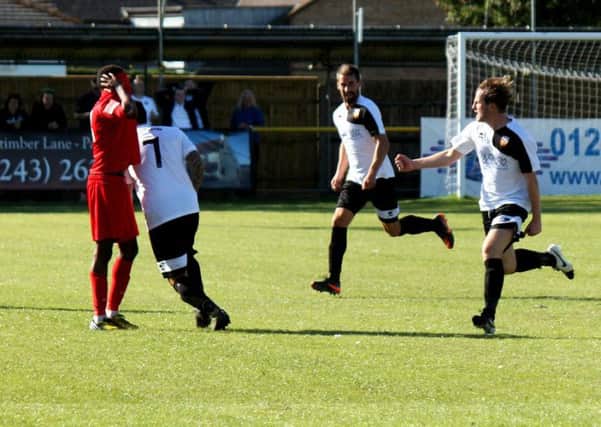 Dan Kempson celebrates his halfway-line goal against Carshalton / Picture by Roger Smith