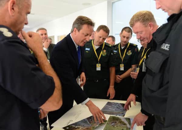 Prime Minister David Cameron meets emergency services staff who attended the Shoreham air crash  Picture: Georgina Coupe