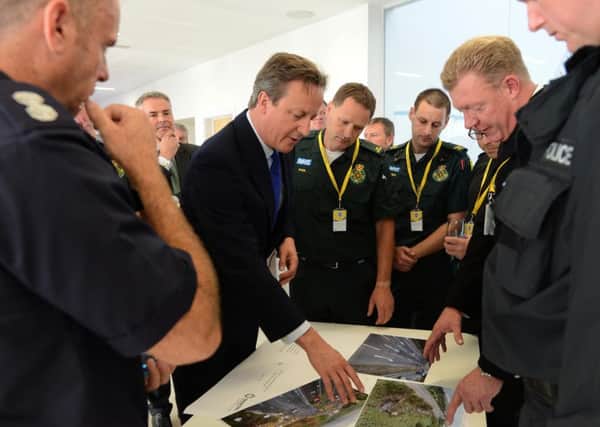 Prime Minister David Cameron meets emergency services staff who attended the Shoreham air crash Pictures: Georgina Coupe