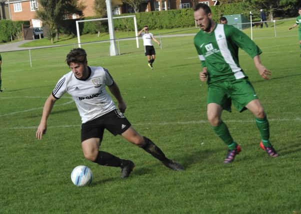 Anthony Cooper on the ball for Bexhill United in their 1-1 draw at home to Mile Oak. Picture by Simon Newstead (SUS-150919-193819002)