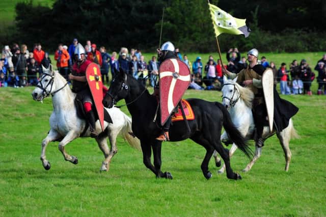 11/10/14- Battle of Hastings re-enactment, Battle. SUS-141110-180624001