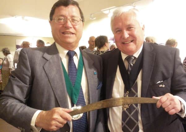 Adur District Council chairman Carson Albury and Worthing mayor Michael Donin with the 1918 pickaxe