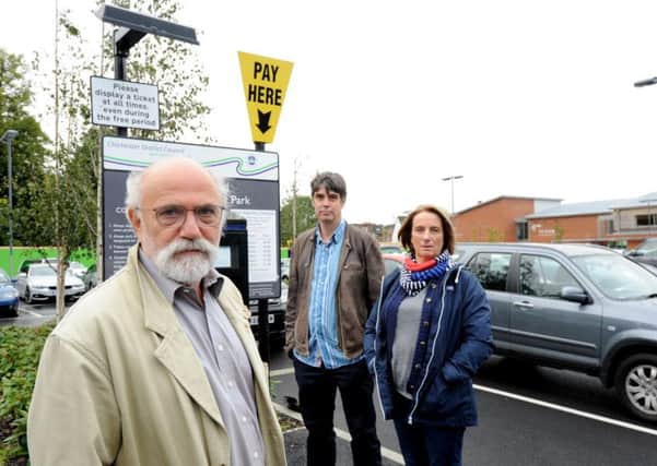Midhurst's representive on CDC' s parking forum 
Steve Morley faces an uphill battle against charges pictured with  leading trader Geoff Allnut, and town councillor and trader Carolyn Bishop