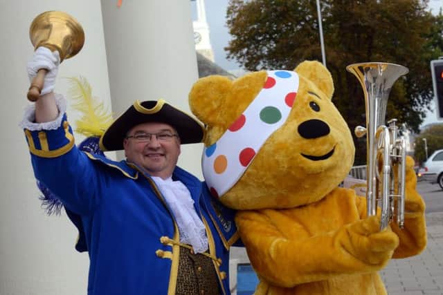 W40608H14

The Brasbandathon for children in Need at St Pauls centre Worthing on Saturday. Pudsey with Bob Smytherman Town Cryer SUS-140410-111827001