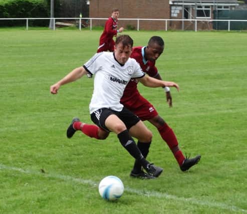 Chris Cumming-Bart on the ball for Bexhill United during their recent FA Vase tie against AFC Croydon Athletic. Picture courtesy Mark Killy
