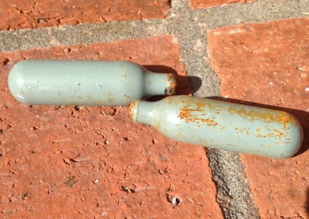Empty canisters of nitrous oxide in a car park in Horsham this week