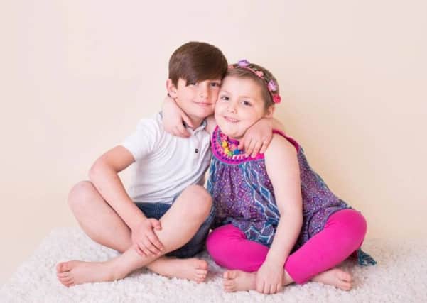 Amelia-Jayne, 6, with brother Charlie, 7. wendyhudsonphotography