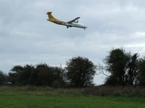 An Aurigny flight preparing to land. SUS-150927-122618001