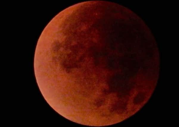 Reader Sid Saunders sent in this photograph of the Super Blood Moon