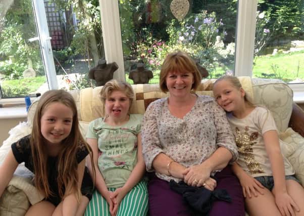Phoebe, Molly, mum Nichola and Emily.
13-year-old Molly Green and her family are helped by Chestnut Tree house children's hospice.
Such families benefit from fundraising efforts like the hospice's charity trek to China in October 2015.