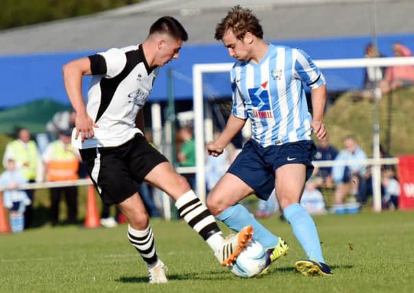 Dan Huet (left) was on target for East Preston in their defeat away to Eastbourne United on Saturday