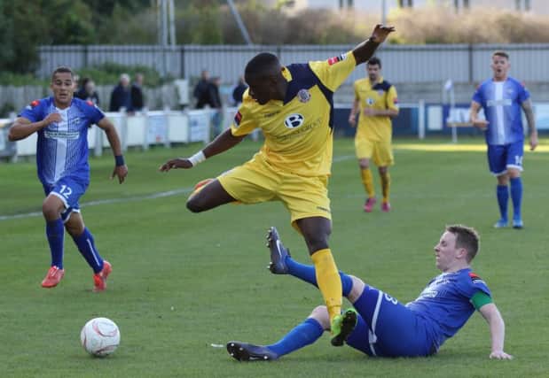Bright Temba tries to ride a tackle during Hastings United's 1-1 draw away to Herne Bay on Saturday. Picture courtesy Scott White