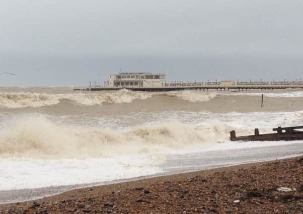 The high tide at Worthing Pier in January 2014. Picture by Karl Dimmock