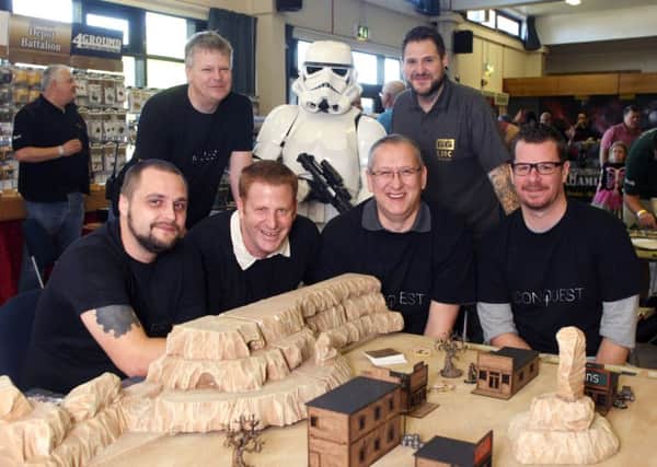 DM15117181a Organisers from Gambit Games UK at the Shoreham Centre for the Conquest convention