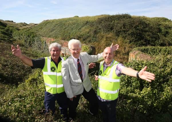 DM151178856a.jpg Littlehampton Fort Restoration Project and Littlehampton Golf Club have reached agreement over the Napoleonic fort. L to R Bill Dalson, Tony Bence and Andy Orpin. Photo by Derek Martin SUS-150929-161430008